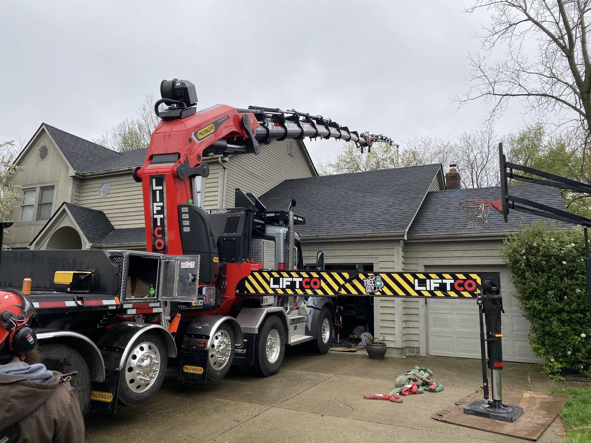 Crane Over House